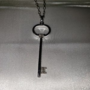 Jared Galleria long chain with key.